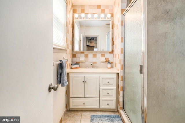 1057 Fitzwatertown Rd, Roslyn, PA 19001 - full bath with vanity, a stall shower, tile patterned floors, decorative backsplash, and tile walls