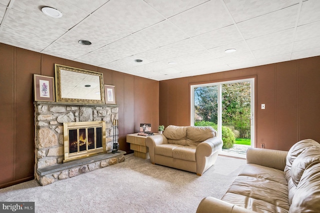 1057 Fitzwatertown Rd, Roslyn, PA 19001 - carpeted living area with a stone fireplace