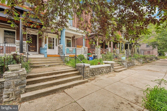 251 S 46th St, Philadelphia, PA 19139 - view of front facade featuring covered porch