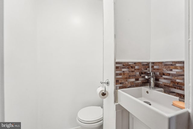 251 S 46th St, Philadelphia, PA 19139 - half bathroom featuring toilet and a sink