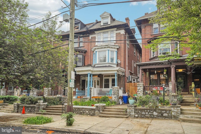 251 S 46th St, Philadelphia, PA 19139 - view of front of house with covered porch and brick siding