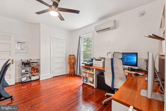 251 S 46th St, Philadelphia, PA 19139 - office space featuring ceiling fan, an AC wall unit, baseboards, and wood-type flooring