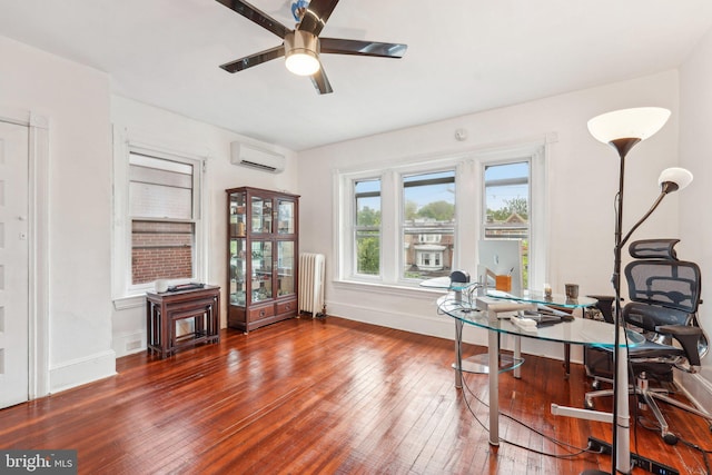 251 S 46th St, Philadelphia, PA 19139 - office area with a ceiling fan, wood-type flooring, radiator heating unit, baseboards, and an AC wall unit