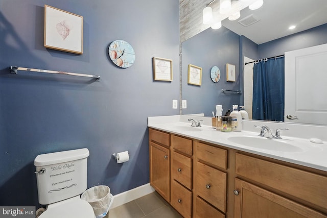 131 Boxelder Dr, Stafford, VA 22554 - bathroom featuring visible vents, toilet, tile patterned flooring, and a sink