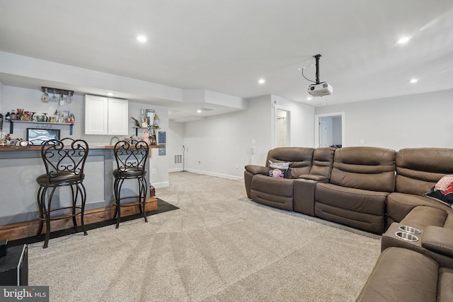 131 Boxelder Dr, Stafford, VA 22554 - living room featuring recessed lighting, light colored carpet, bar, and baseboards