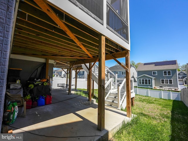 131 Boxelder Dr, Stafford, VA 22554 - view of patio featuring fence, stairway, and a residential view