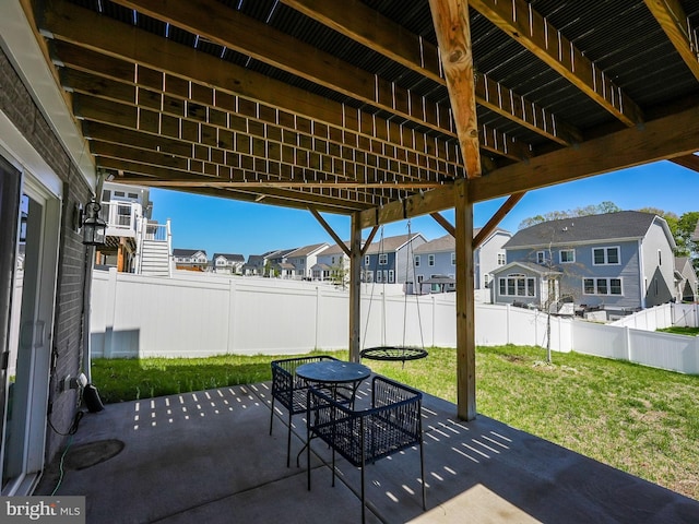 131 Boxelder Dr, Stafford, VA 22554 - view of patio / terrace featuring a fenced backyard, a residential view, and outdoor dining area