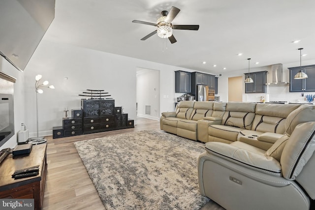 131 Boxelder Dr, Stafford, VA 22554 - living room featuring visible vents, recessed lighting, a ceiling fan, and light wood-style floors