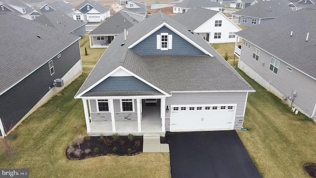 drone / aerial view featuring a residential view