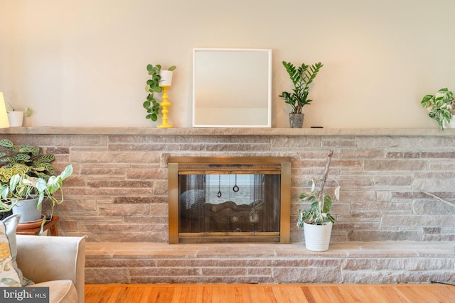 details featuring wood finished floors