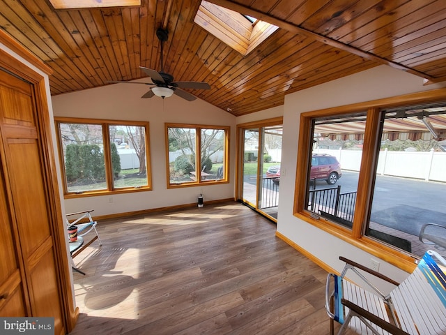 212 University Dr, Mont Alto, PA 17237 - sunroom featuring wood ceiling, baseboards, vaulted ceiling with skylight, and wood finished floors