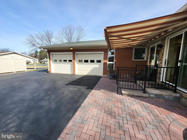 212 University Dr, Mont Alto, PA 17237 - garage featuring aphalt driveway