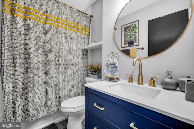 2357 Generation Dr, Reston, VA 20191 - bathroom featuring vanity, toilet, and curtained shower