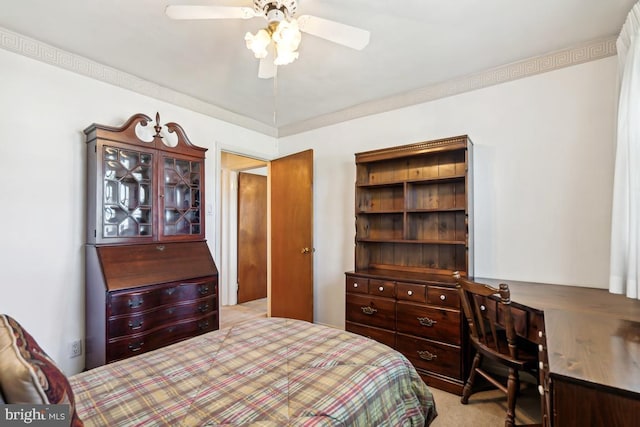 carpeted bedroom with a ceiling fan
