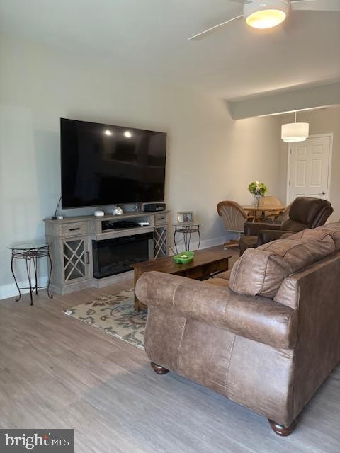 30609 Cedar Neck Rd Unit 3109, Ocean View, DE 19970 - living area featuring baseboards and wood finished floors