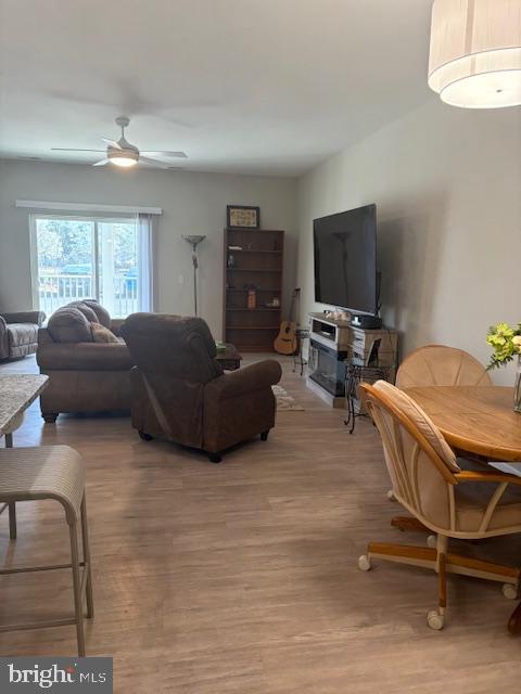 30609 Cedar Neck Rd Unit 3109, Ocean View, DE 19970 - living area with ceiling fan and light wood finished floors