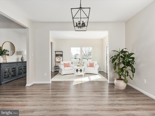 162 Blackford Dr, Stephenson, VA 22656 - sitting room with an inviting chandelier, baseboards, and wood finished floors