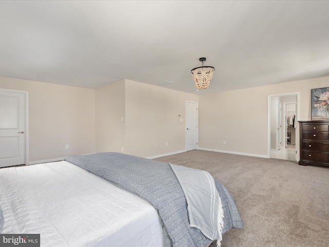 162 Blackford Dr, Stephenson, VA 22656 - carpeted bedroom with a notable chandelier and baseboards