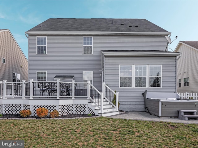 162 Blackford Dr, Stephenson, VA 22656 - back of house featuring a yard, a deck, a patio area, and a hot tub