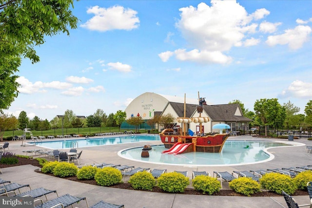 162 Blackford Dr, Stephenson, VA 22656 - community pool featuring a water play area, playground community, fence, and a patio