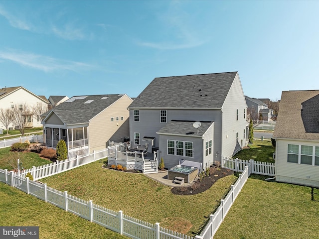 162 Blackford Dr, Stephenson, VA 22656 - rear view of house with a fenced backyard, a residential view, a deck, and a yard