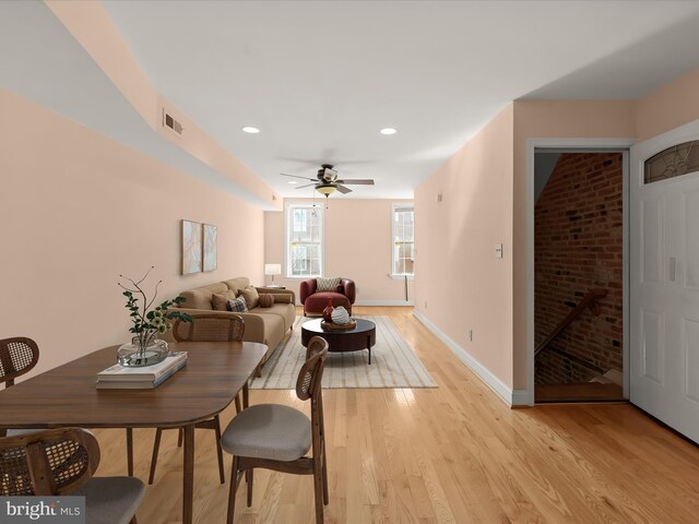 dining area with visible vents, light wood finished floors, baseboards, ceiling fan, and recessed lighting