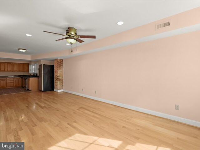 unfurnished living room featuring light wood-style flooring, visible vents, baseboards, ceiling fan, and recessed lighting