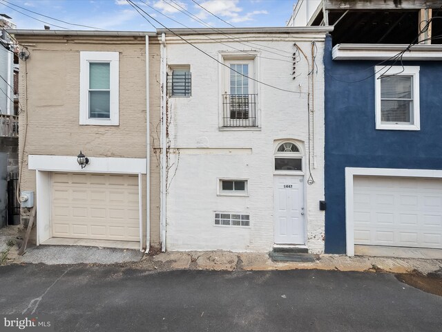 view of property with a garage