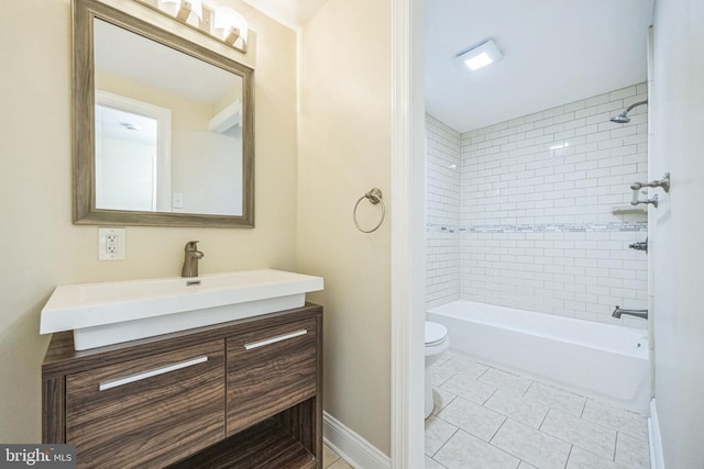 full bath featuring tub / shower combination, baseboards, toilet, tile patterned floors, and vanity