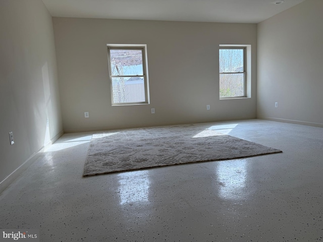 spare room with a healthy amount of sunlight