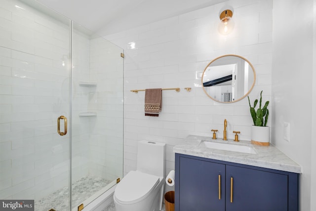 1335 N Pegram St N, Alexandria, VA 22304 - full bathroom with vanity, lofted ceiling, toilet, tile walls, and a shower stall