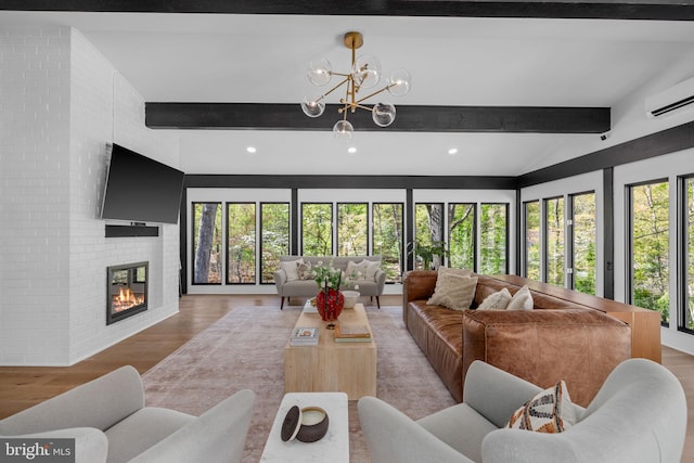 1335 N Pegram St N, Alexandria, VA 22304 - living room featuring an inviting chandelier, recessed lighting, vaulted ceiling with beams, a wall unit AC, and light wood-style flooring