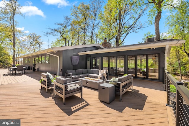 1335 N Pegram St N, Alexandria, VA 22304 - wooden terrace featuring outdoor dining space and an outdoor living space with a fire pit