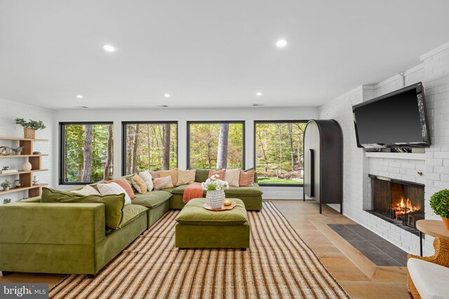 1335 N Pegram St N, Alexandria, VA 22304 - living area featuring recessed lighting, wood finished floors, a healthy amount of sunlight, and a fireplace