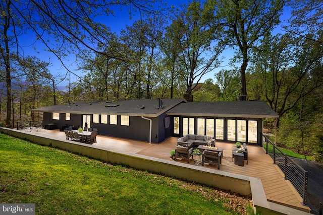 1335 N Pegram St N, Alexandria, VA 22304 - back of house with a yard, a deck, outdoor lounge area, and a shingled roof
