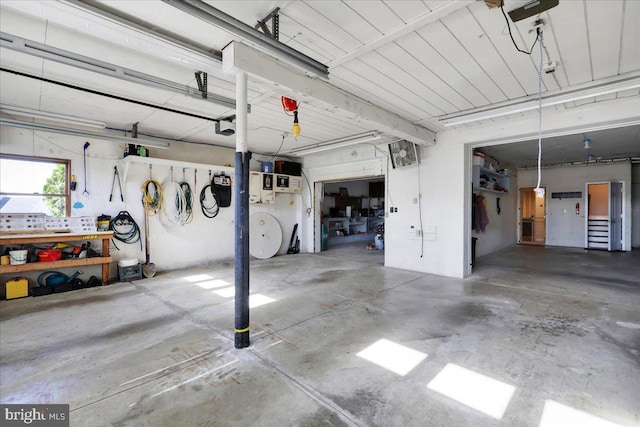 garage with a workshop area