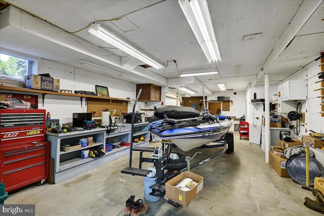 garage featuring a workshop area