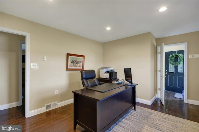 office area with recessed lighting, baseboards, visible vents, and dark wood-style floors
