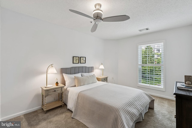 249 S Pickett St Unit 302, Alexandria, VA 22304 - carpeted bedroom with baseboards, a textured ceiling, and a ceiling fan