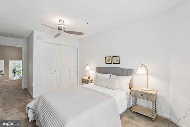 249 S Pickett St Unit 302, Alexandria, VA 22304 - bedroom with carpet floors, a closet, baseboards, and ceiling fan