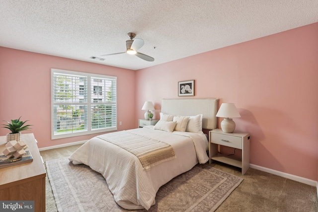 249 S Pickett St Unit 302, Alexandria, VA 22304 - bedroom with carpet, a ceiling fan, baseboards, and a textured ceiling