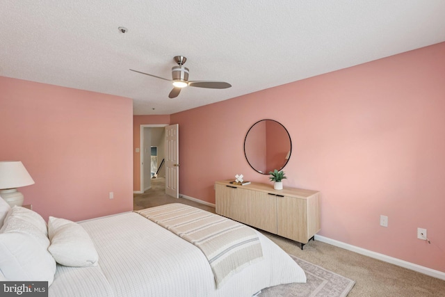 249 S Pickett St Unit 302, Alexandria, VA 22304 - bedroom with light carpet, baseboards, and ceiling fan