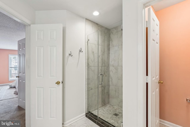 249 S Pickett St Unit 302, Alexandria, VA 22304 - bathroom with a shower stall, baseboards, marble finish flooring, and recessed lighting