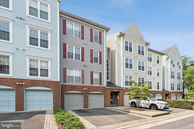 249 S Pickett St Unit 302, Alexandria, VA 22304 - view of property with driveway