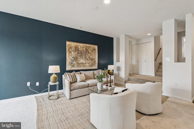 249 S Pickett St Unit 302, Alexandria, VA 22304 - living area featuring stairs, light colored carpet, baseboards, and recessed lighting