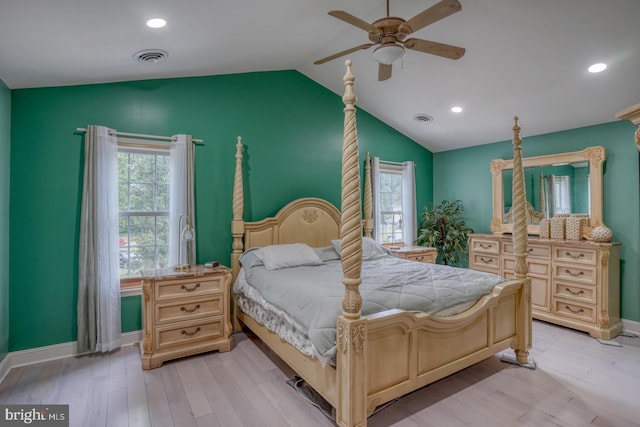 bedroom with lofted ceiling, light wood-type flooring, multiple windows, recessed lighting, and baseboards
