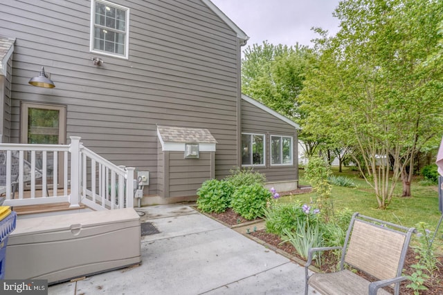 rear view of property with a patio area