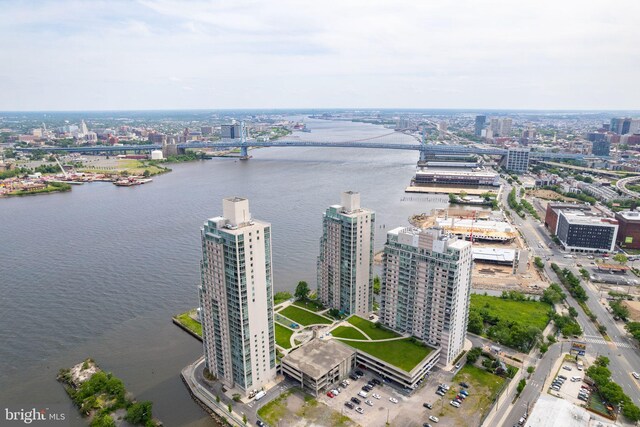 aerial view featuring a view of city and a water view