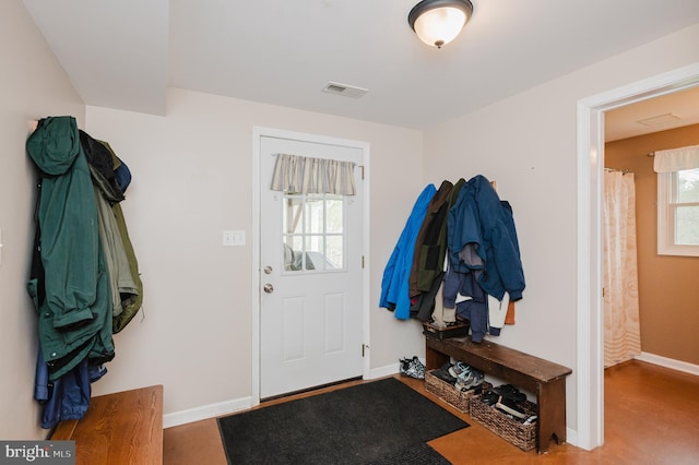 mudroom with baseboards and visible vents