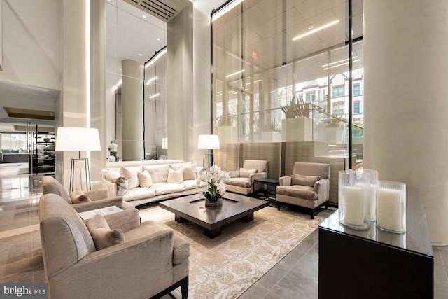 building lobby featuring a towering ceiling